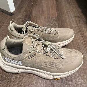 Hoka Beige Athletic Shoes with White and Yellow Accents